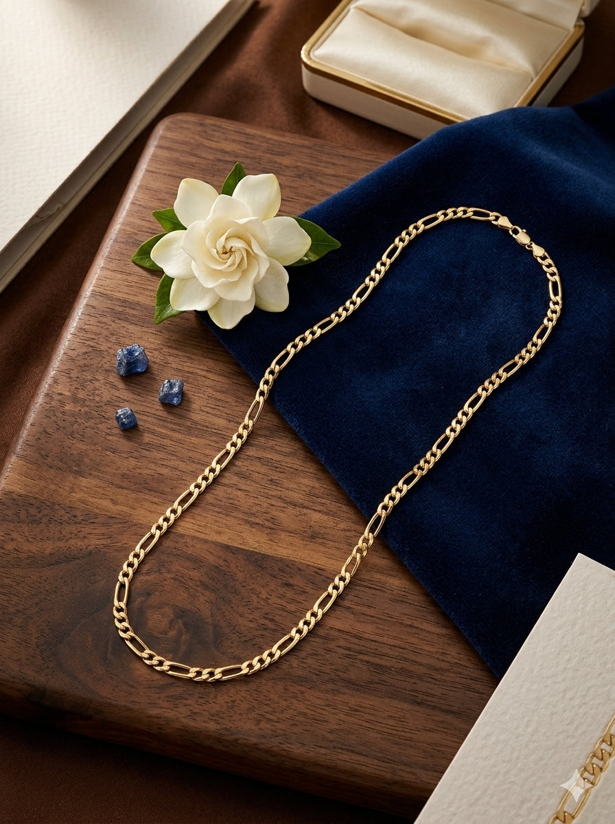 Cadena Figaro de 60 cm en baño de oro de 14k unisex