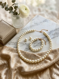 Juego collar ,pulso y Aretes de perlas