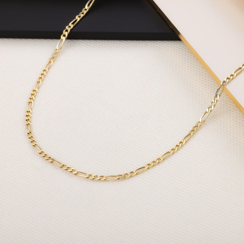 Cadena Figaro delgada ondulada  de 60cm en baño de oro de 14k