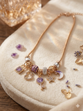 Cadena serpiente con charms